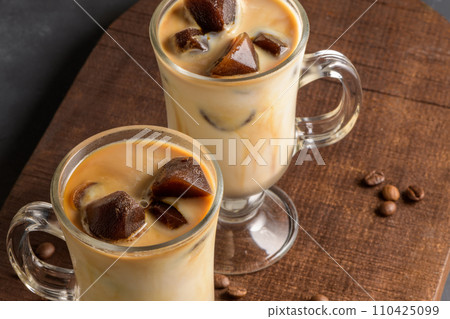 Iced coffee in glass jars 110425099
