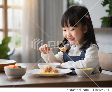 child eating rice child eating rice 110425281