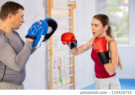 Woman training in gym Woman training in gym 110426742