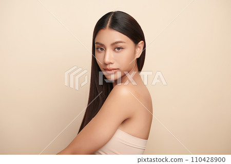 Beautiful young asian woman with clean fresh skin on beige background, Face care, Facial treatment, Cosmetology, beauty and spa, Asian women portrait. 110428900