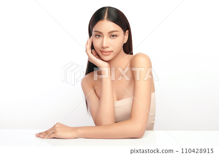 Beautiful young asian woman with clean fresh skin on white background, Face care, Facial treatment, Cosmetology, beauty and spa, Asian women portrait. Beautiful young asian woman with clean fresh skin on white background, Face care, Facial treatment, Cosmetology, beauty and spa, Asian women portrait. 110428915