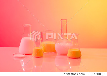 A flat-bottom florence flask, petri dish, a mug and conical flasks of liquid arranged on gradient background. Research science content 110430030