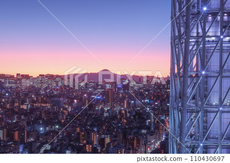 An evening Mt Fuji view from Solamachi building next to Tokyo Skytree in Tokyo, Japan. January 4, 2024 An evening Mt Fuji view from Solamachi building next to Tokyo Skytree in Tokyo, Japan. January 4, 2024 110430697
