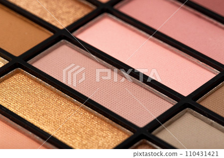 Set of cosmetics powder eye shadows with different shades, close-up. Design 110431421
