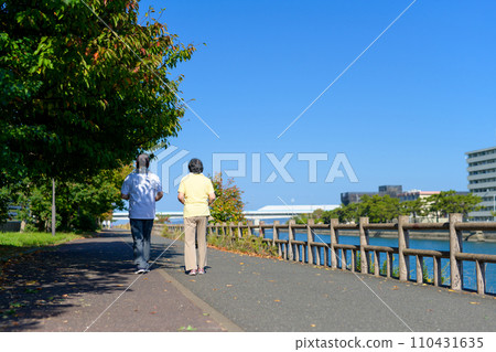 Active senior male and female couples walking for health. Diet, exercise, healthy habits, walking. Active senior male and female couples walking for health. Diet, exercise, healthy habits, walking. 110431635