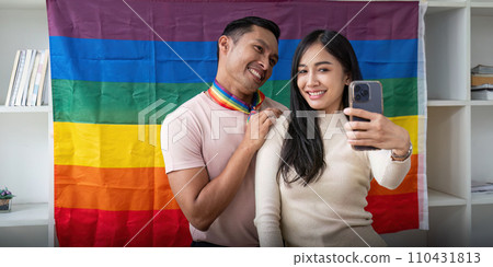 Attractive cheerful gay man enjoy while selfie with female friend 110431813
