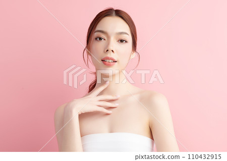 Beautiful young asian woman with clean fresh skin on pink background, Face care, Facial treatment, Cosmetology, beauty and spa, Asian women portrait. 110432915
