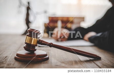 Law theme, mallet of the judge, law enforcement officers, evidence-based cases and documents taken into account.. 110433184