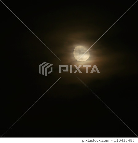 Full moon over dark black sky at night. Mysterious concept with clouds, fog and moon. Full moon over dark black sky at night. Mysterious concept with clouds, fog and moon. 110435495
