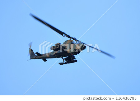 Japan Ground Self-Defense Force AH-1S helicopter in flight 110436793