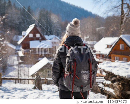 AI-generated content. Girl with a tourist backpack in the mountains in winter. AI AI-generated content. Girl with a tourist backpack in the mountains in winter. AI 110437673