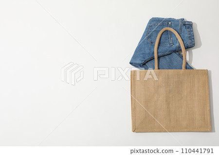 A bag with jeans and a hat 110441791