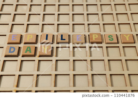 Inscription Epilepsy Day in wooden letters on a wooden background Inscription Epilepsy Day in wooden letters on a wooden background 110441876