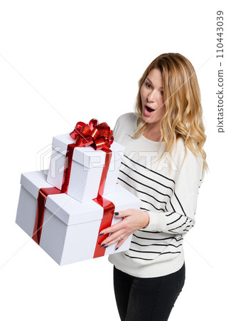 Happy young woman with white gift boxes on white background. 110443039