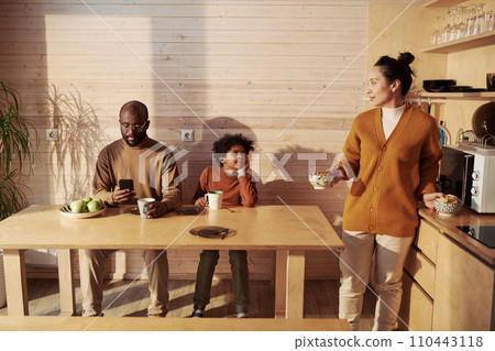 Young family preparing for breakfast 110443118
