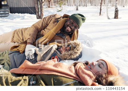 Young laughing intercultural family Young laughing intercultural family 110443154