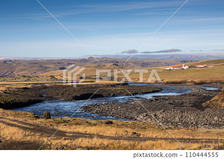 Autumn country with a river, east Iceland 110444555