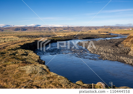 Autumn country with a river, east Iceland Autumn country with a river, east Iceland 110444558