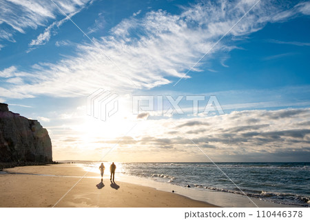 Coastal Walk into the Sunset 110446378
