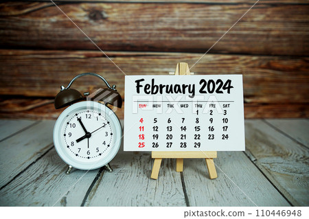 February 2024 monthly calendar on easel stand on wooden background February 2024 monthly calendar on easel stand on wooden background 110446948