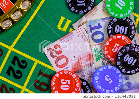 Roulette casino table is with Georgian banknotes, lari, poker chips. 110448081