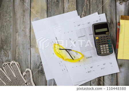 Remodeling kitchen with cabinets plan using blueprint designed by an architectural engineer Remodeling kitchen with cabinets plan using blueprint designed by an architectural engineer 110448380