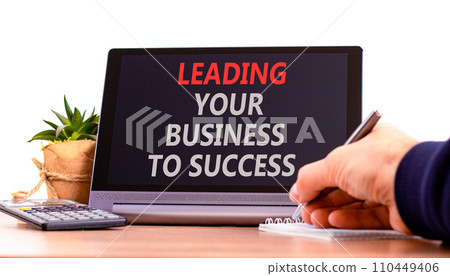 Leading your business to success symbol. Concept words Leading your business to success on beautiful black tablet. Beautiful white background. Leading your business to success concept. Copy space Leading your business to success symbol. Concept words Leading your business to success on beautiful black tablet. Beautiful white background. Leading your business to success concept. Copy space 110449406