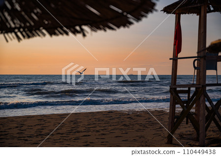 Spille beach during sunset in Albania  110449438