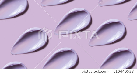 Seamless pattern of violet cosmetic cream smear on pastel pink background. Beauty product texture, light purple smudge such as body butter, lotion, conditioner, shower gel or shampoo, top view Seamless pattern of violet cosmetic cream smear on pastel pink background. Beauty product texture, light purple smudge such as body butter, lotion, conditioner, shower gel or shampoo, top view 110449538