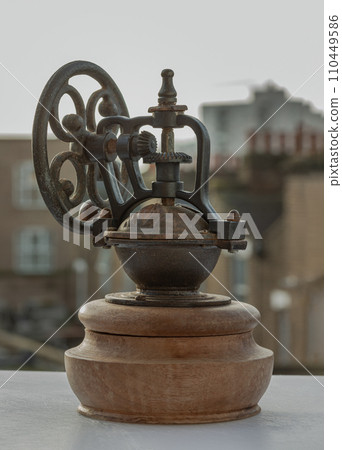 Antique coffee bean original grinder metal shake wheel with hand crank. Antique coffee bean original grinder metal shake wheel with hand crank. 110449586