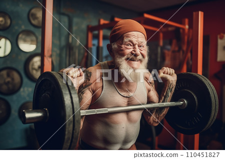 Fitness man at workout. Elderly pensioner old man smiling in gym. Fitness man at workout. Elderly pensioner old man smiling in gym. 110451827