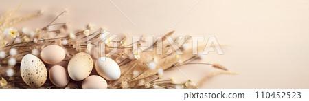 AI-generated content. Natural Easter background with eggs, plants and copy space. Soft, beige color. Perfect for spring themes, Easter content, and rustic or minimalist design projects. Panoramic 110452523