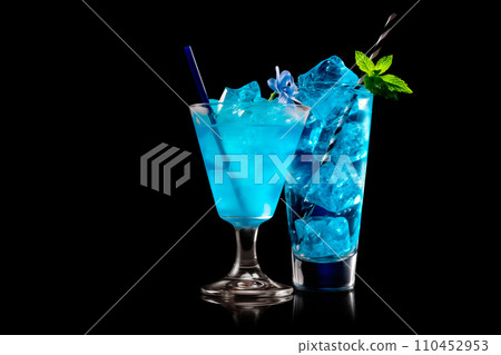 Set of Blue Curacao cocktails garnished with a lime isolated on black background Set of Blue Curacao cocktails garnished with a lime isolated on black background 110452953