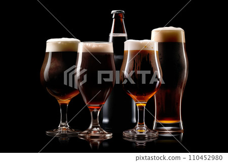 Set of Beer glasses and bottles on a black background. Mugs with drink like Ipa, Pale Ale, Pilsner, Porter or Stout Set of Beer glasses and bottles on a black background. Mugs with drink like Ipa, Pale Ale, Pilsner, Porter or Stout 110452980