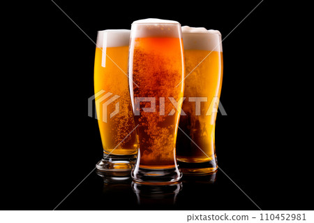 Set of Beer glasses on a black background. Mugs with drink like Ipa, Pale Ale, Pilsner, Porter or Stout 110452981
