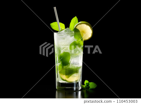 Mojito cocktail, garnished with fresh mint and a slice of lime in a tall glass Mojito cocktail, garnished with fresh mint and a slice of lime in a tall glass 110453003