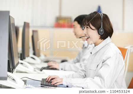 Female engineer talking remotely Female engineer talking remotely 110453324