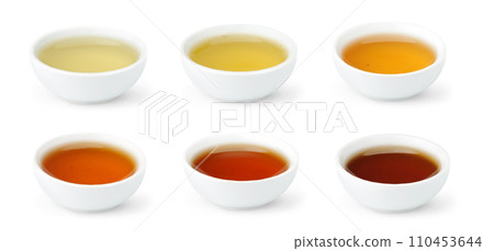 Brewed Chinese teas of different color in white bowls isolated on white background Brewed Chinese teas of different color in white bowls isolated on white background 110453644