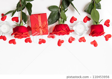 Frame from red hearts and roses on white background. Valentine's day greeting card. Layout with place for text. Frame from red hearts and roses on white background. Valentine's day greeting card. Layout with place for text. 110453956