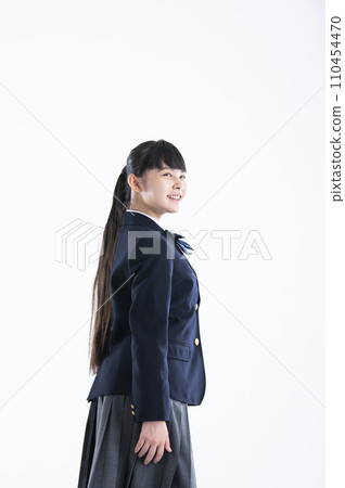 Junior high school girl turning around, white background Junior high school girl turning around, white background 110454470