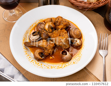 Stewed pork and potato pieces served in a plate Stewed pork and potato pieces served in a plate 110457612
