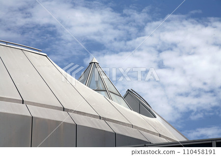 Modern art museum roof and blue sky 110458191