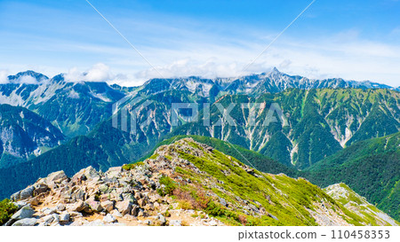 Climbing Mt. Jonendake in summer (view towards Mt. Yarigatake from the summit of Mt. Jonendake) Climbing Mt. Jonendake in summer (view towards Mt. Yarigatake from the summit of Mt. Jonendake) 110458353