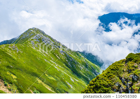 Climbing Mt. Jonendake in summer (view towards Mt. Jonendake from the summit of Mt. Jonendake) 110458380