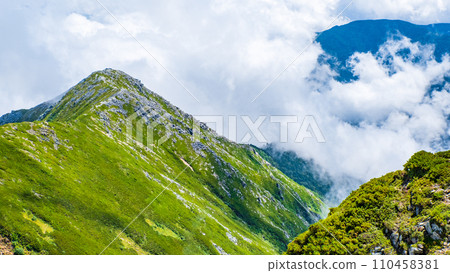 Climbing Mt. Jonendake in summer (view towards Mt. Jonendake from the summit of Mt. Jonendake) 110458381