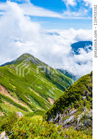 Climbing Mt. Jonendake in summer (view towards Mt. Jonendake from the summit of Mt. Jonendake) 110458382