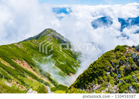 Climbing Mt. Jonendake in summer (view towards Mt. Jonendake from the summit of Mt. Jonendake) 110458387
