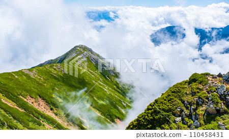 Climbing Mt. Jonendake in summer (view towards Mt. Jonendake from the summit of Mt. Jonendake) Climbing Mt. Jonendake in summer (view towards Mt. Jonendake from the summit of Mt. Jonendake) 110458431