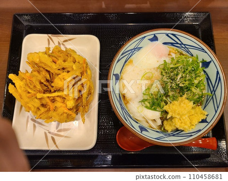 Warm egg yam bukkake udon and kakiage Warm egg yam bukkake udon and kakiage 110458681