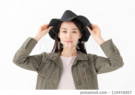 A woman wearing a hat A woman wearing a hat 110458807